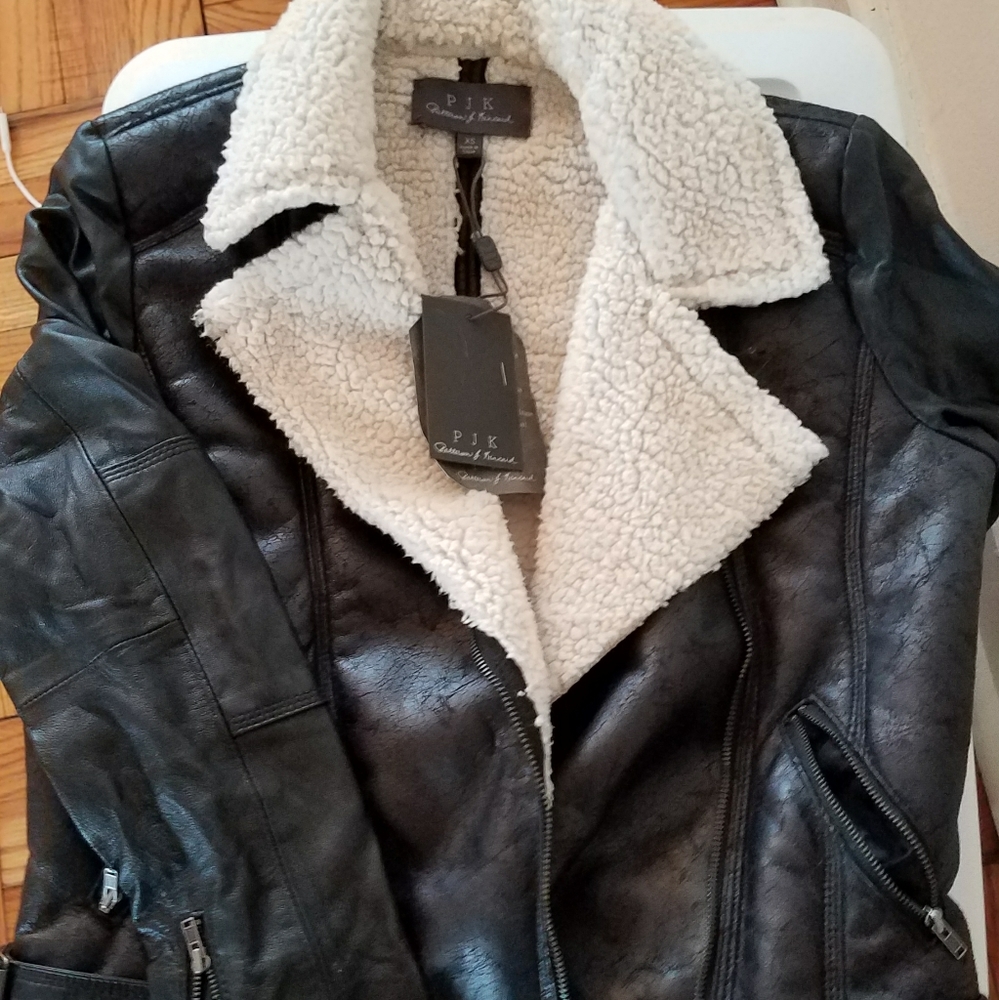 Brand New 100% black leather jacket.